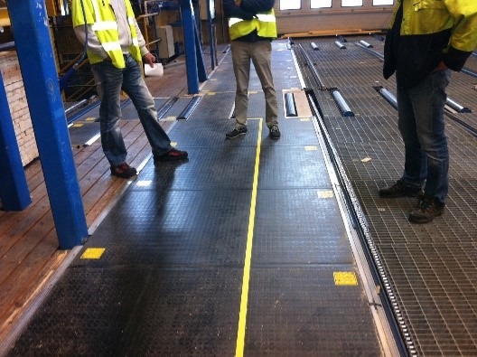 aplicación alfombra seguridad